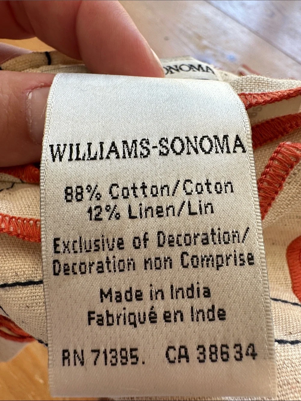 Williams Sonoma Cream Napkins with Navy Grid and Orange trim
